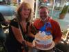 Look who turned 59! Randy Lee gets cake from wife Lisa. 